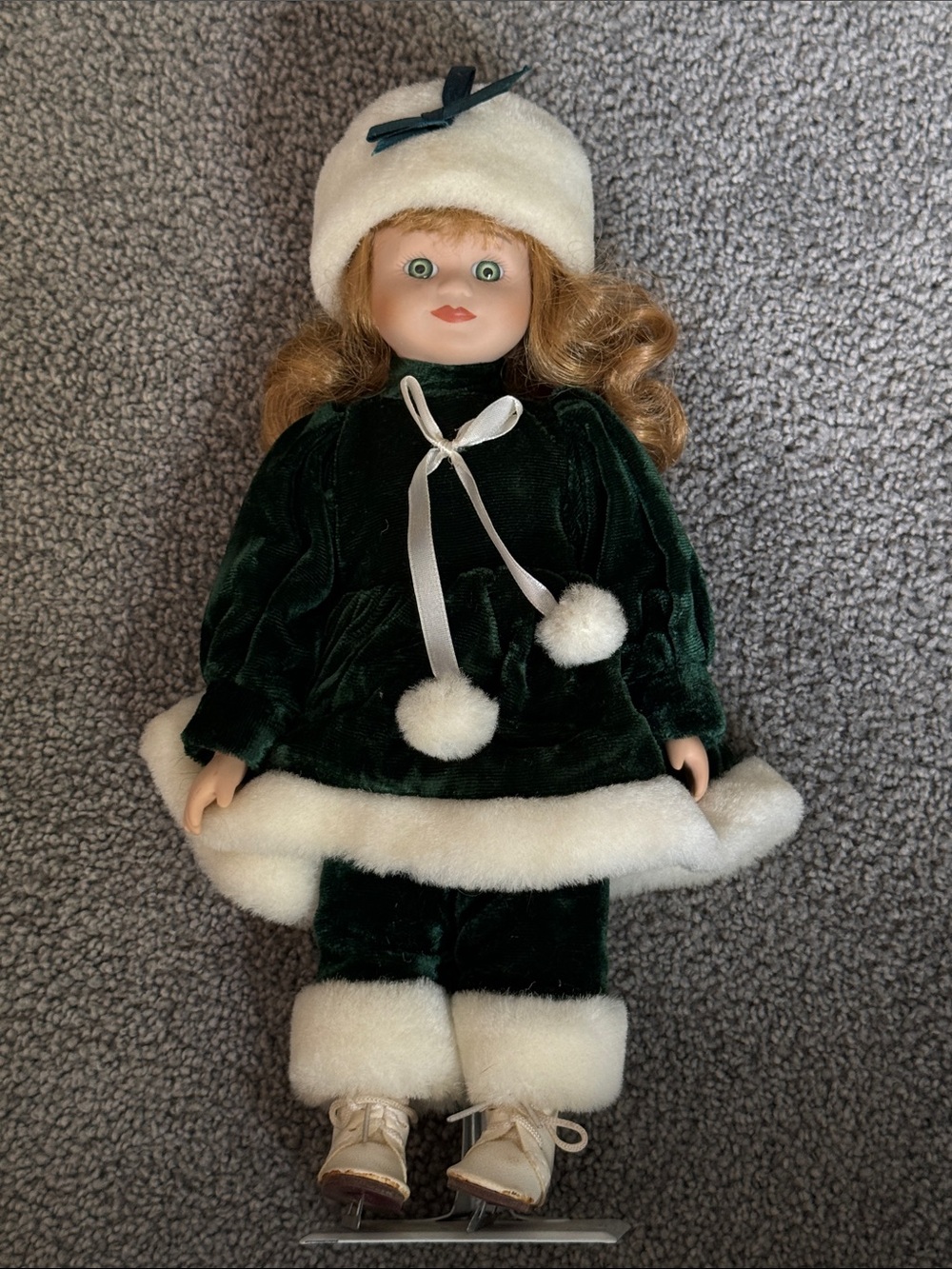 Vintage Porcelain Doll in Dark Green and White Plush Winter Outfit. W/Stand.